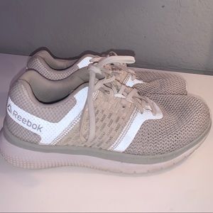White Reebok athletic shoes